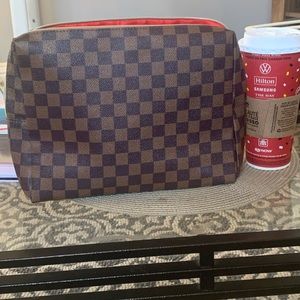 Brown checkered makeup bag